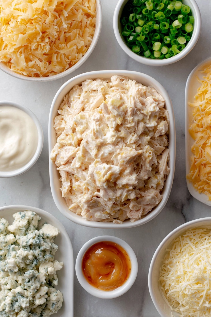 Flat lay of a small block of cream cheese, a heap of cooked shredded chicken, a small white bowl filled with bright orange hot sauce, a small white bowl of creamy ranch dressing, a few sliced green onions scattered neatly, a small pile of shredded cheddar cheese, a separate small pile of shredded mozzarella cheese, and a small white bowl with crumbled blue cheese, all arranged symmetrically on simple white ceramic dishes, placed on a clean white marble surface, soft natural light, photo taken with an iPhone, professional food photography style, fresh ingredients, white ceramic bowls, no bottles, no duplicates, no utensils, no packaging --ar 2:3 --v 7 --p m7354615311229779997